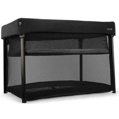 Nuna Paal Playard in Caviar color, featuring a sturdy black frame and mesh sides for visibility and ventilation.