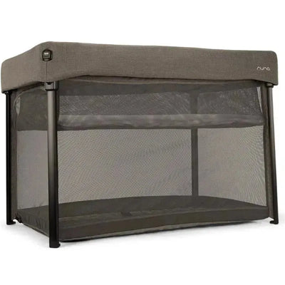 Nuna PAAL™ Playard in Granite, featuring a soft fabric top and breathable mesh sides for safety and visibility.