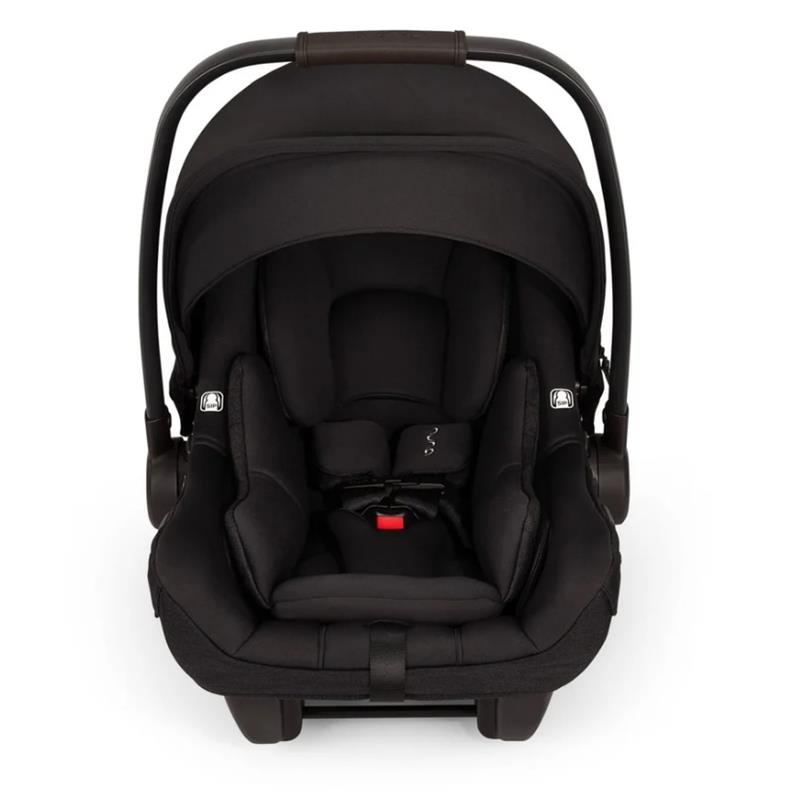 Nuna Pipa Aire Rx infant car seat in Caviar color, featuring a protective canopy and adjustable harness, against a white background.