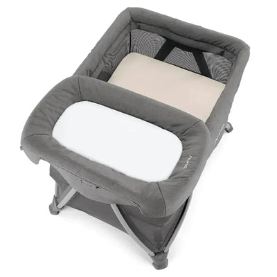 Nuna SENA™ aire Playard with Zip-Off Bassinet and Changer in granite, featuring a soft padded bassinet and mesh sides for ventilation.