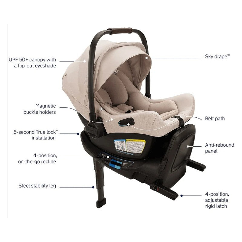 Nuna Swiv + Pipa Aire Rx Travel System in Biscotti, featuring a beige infant car seat with a UPF 50+ canopy, magnetic buckle holders, and labeled safety features.