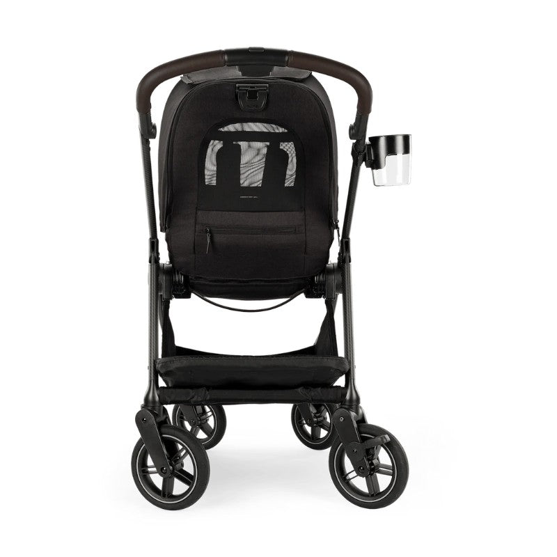 Nuna Swiv + Pipa Aire Rx travel system in caviar/chocolate color, featuring a sleek stroller with a cup holder and ample storage.