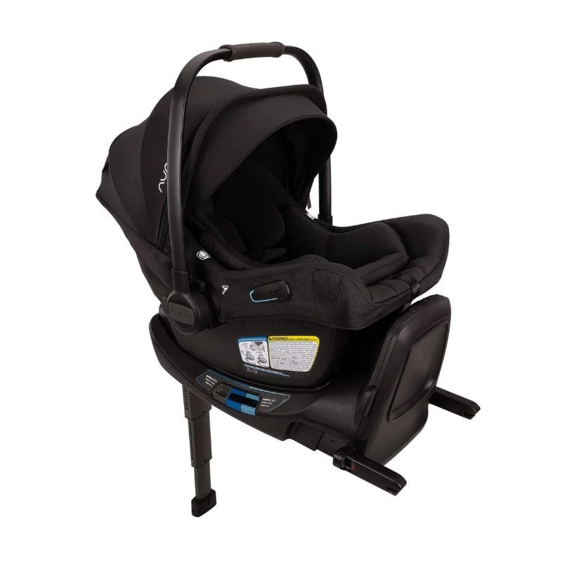 Nuna Swiv + Pipa Aire Rx Travel System in Caviar/Chocolate, featuring a safety infant car seat with a sleek design and adjustable handle.