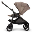 Nuna Swiv + Pipa Aire Rx Travel System in Cedar/Caviar, featuring a stylish stroller with adjustable canopy and mesh storage.