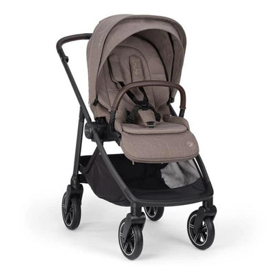 Nuna x BMW SWIV™ Stroller in Umber with a padded seat, protective canopy, and four wheels, designed for comfortable mobility.