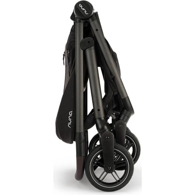 Nuna SWIV™ Stroller in Caviar/Chocolate color, folded for compact storage, showcasing its sleek design and sturdy wheels.