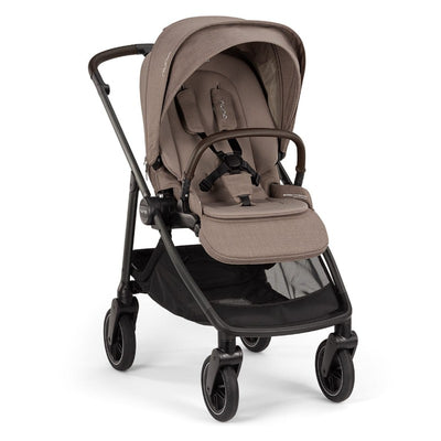 Nuna Swiv Stroller in Cedar/Caviar color, featuring a padded seat, adjustable canopy, and spacious under-seat storage.