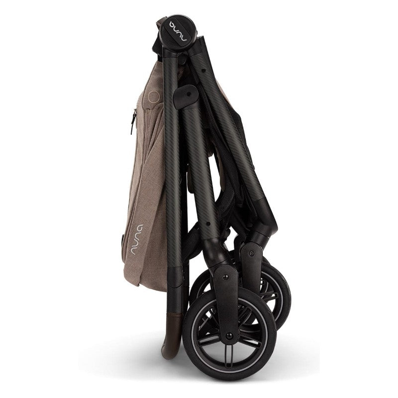 Nuna Swiv stroller in a folded position, featuring a light brown fabric and sleek black frame, with triple wheels.