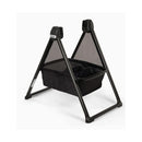 Nuna Swiv bassinet stand in black with a mesh design, featuring a sturdy frame and storage basket.