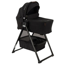 Nuna Swiv™ & Triv™ Series Bassinet + Stand, Caviar/Chocolate Image 1