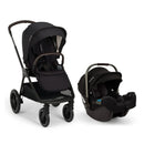 Nuna Triv Lx stroller in Caviar color next to Pipa Rx car seat, both featuring a sleek black design.