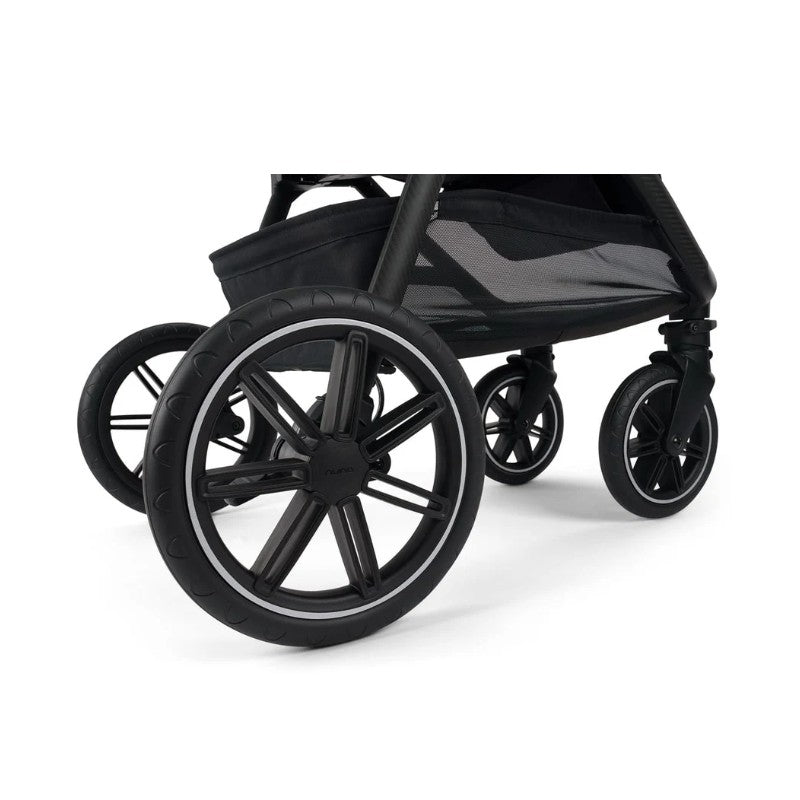 Nuna Triv Lx stroller with sleek black wheels, showcasing a modern design and sturdy construction.