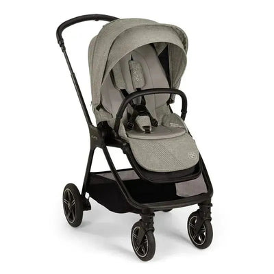 Nuna TRIV™ next stroller in Graphene color with a magnetic buckle, featuring a sleek design and adjustable canopy.