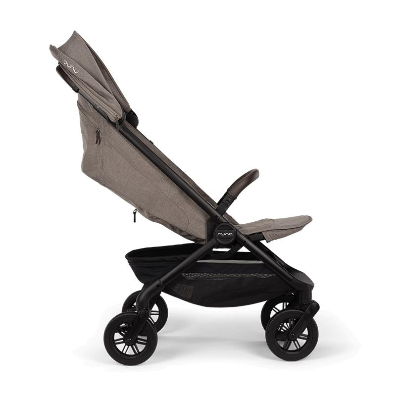 Nuna Trvl 360 Compact Stroller in Cedar color, featuring a lightweight design and adjustable seat, shown from the side.