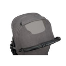 Nuna Trvl 360 Compact Stroller in pewter color with a large canopy and a mesh peek-a-boo window.