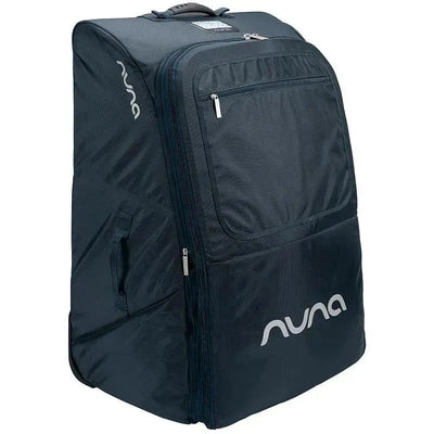 Wheeled travel bag in indigo from Nuna, featuring multiple compartments and a sturdy handle for easy transport.