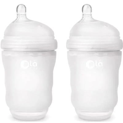 Two 8 oz. frost-colored baby bottles from Ola Baby, featuring soft, gentle designs with clear branding.