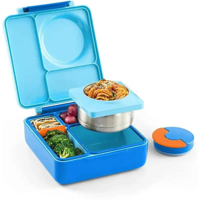 Insulated blue OmieBox Bento box open, featuring a thermos jar holding pasta, and compartments with broccoli, carrots, and grapes.