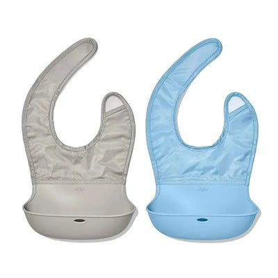 Two roll-up bibs in dusk gray and drizzle blue, featuring a curved design and a built-in catch pocket for easy cleanup.