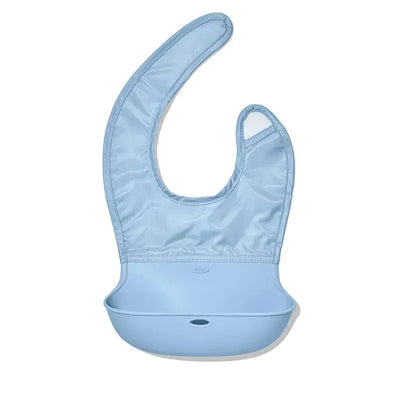 Roll-up bib in light blue with a scoop pocket for catching spills, designed for toddlers during mealtime.