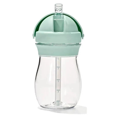 9 oz Tot Transitions Straw Cup in opal with a transparent body and measuring markings, designed for toddlers.