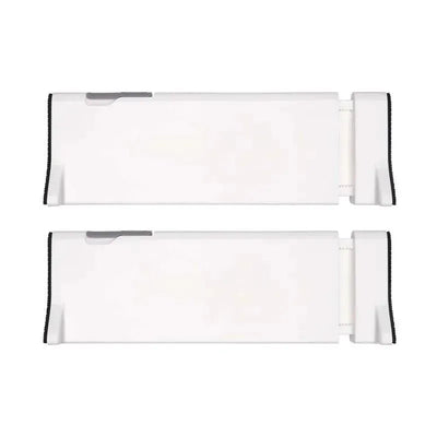 White OXO Tot 2-Pack Drawer Dividers, adjustable with end tabs for organization and space management.