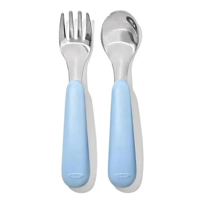 OXO Tot Fork and Spoon Set in Dusk, featuring a soft blue grip and stainless steel utensils, designed for young children.