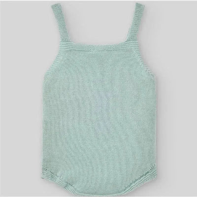 Baby knit bodysuit in cream and beige colors with thin straps, designed for newborns. Soft, textured knit fabric.