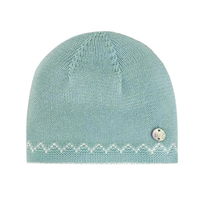 Baby knit hat in soft iris blue with a decorative cream zigzag pattern and a small metal Paz Rodriguez logo.