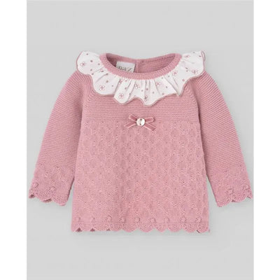 Baby knit sweater in makeup pink featuring a ruffled collar, floral accents, and a decorative bow at the front.