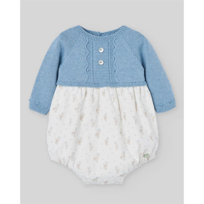 Knit newborn romper in Dutch blue with button details and a white floral patterned bottom, designed for infants.