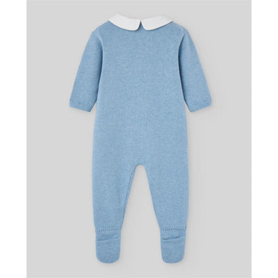 Knit newborn romper in Dutch blue with long sleeves and a white Peter Pan collar.