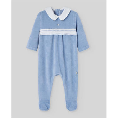 Knit newborn romper in Dutch blue, featuring a white collar and decorative button, designed for comfort and style.