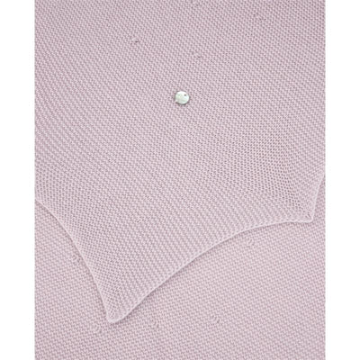 Knit newborn shawl in mauve with textured pattern, featuring a decorative silver embellishment.