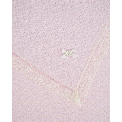 Light pink and cream knitted newborn shawl with lace trim and a small bow detail. Ideal for infants.
