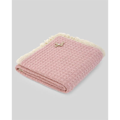 Knit newborn shawl in cream and soft pink, with a textured pattern and decorative lace trim.