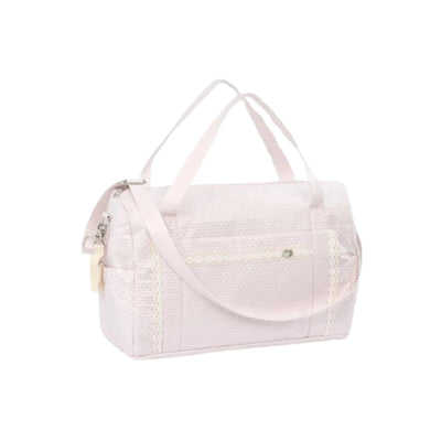 Paz Rodriguez maternity bag in chalk pink and cream with decorative lace trim