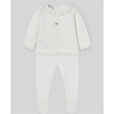 Chalk pink and cream sweater and legging set for infants, featuring a ruffled neckline and decorative bow.