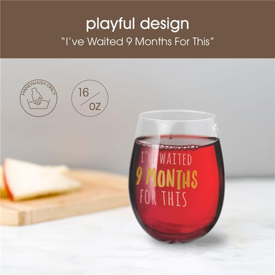 Stemless wine glass filled with red liquid, featuring the text “I’ve Waited 9 Months For This,” set on a marble surface.