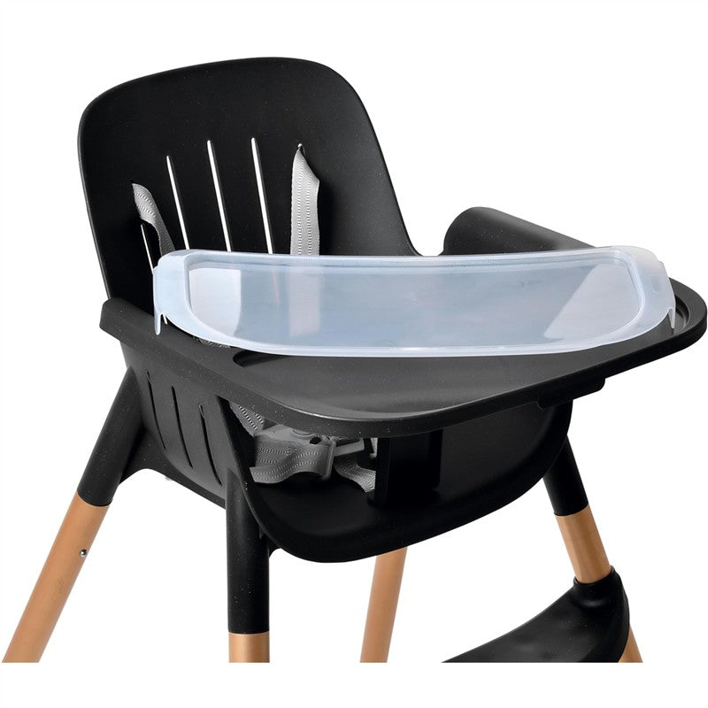 High chair with a black seat, safety straps, and a transparent removable tray, featuring wooden legs.