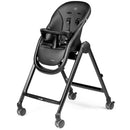 High chair by Peg Living in True Black with a sleek design, safety harness, and rolling wheels for easy mobility.