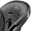 High chair seat in True Black with zippered detail, safety straps, and PE logo, designed for child safety and comfort.