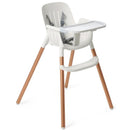 High chair with a white plastic seat and copper-colored legs, featuring a safety harness and a removable tray.