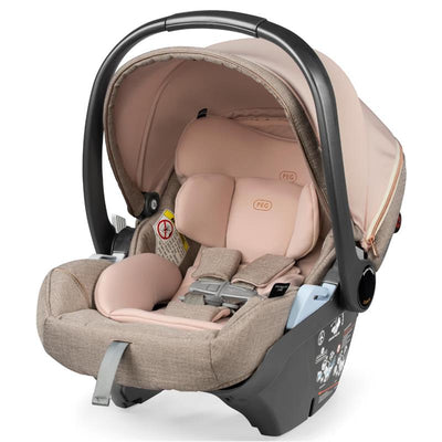 Peg Primo Viaggio Lounge Infant Car Seat in Mon Amour, featuring a soft pink and beige fabric design with a protective canopy.