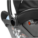 Primo Viaggio Lounge Infant Car Seat in True Black, featuring adjustable handle, safety indicators, and instruction labels.