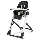 Peg Siesta High Chair in Licorice (Black), featuring a padded seat, safety harness, and a removable tray on a modern frame.