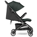 Peg Volo Compact Stroller in sage green with a reclining seat and large sun canopy, featuring a storage basket underneath.