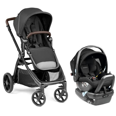 Peg Perego Ypsi Travel System in True Black, featuring a padded seat, adjustable canopy, and sleek frame with four wheels.