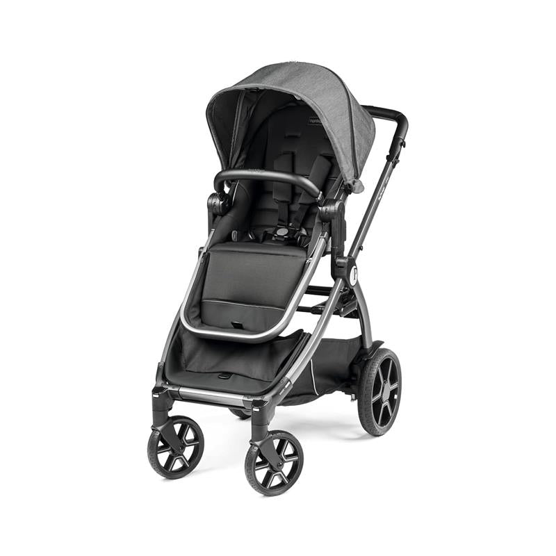 Ypsi Travel System in Vanilla Blend, featuring a sleek stroller with a grey canopy, adjustable seat, and spacious storage.