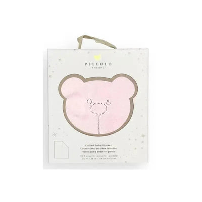 Knitted pink baby blanket featuring a bear design, packaged in a decorative gift box with branding and detailed text.